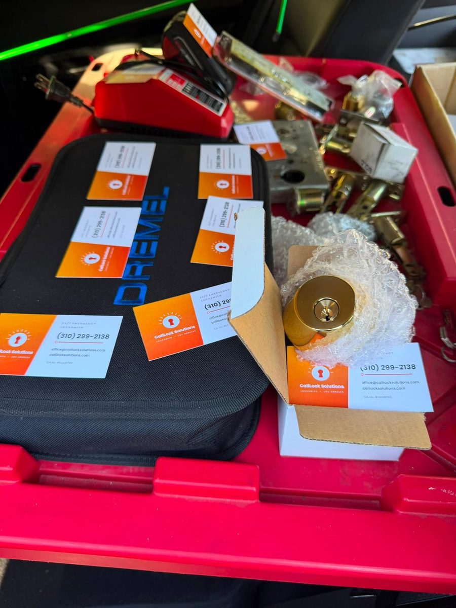 Lock cylinders and door hardware carried on the service vehicle
